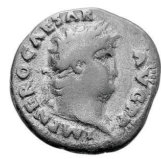 A valuable silver coin minted with the head of a man.