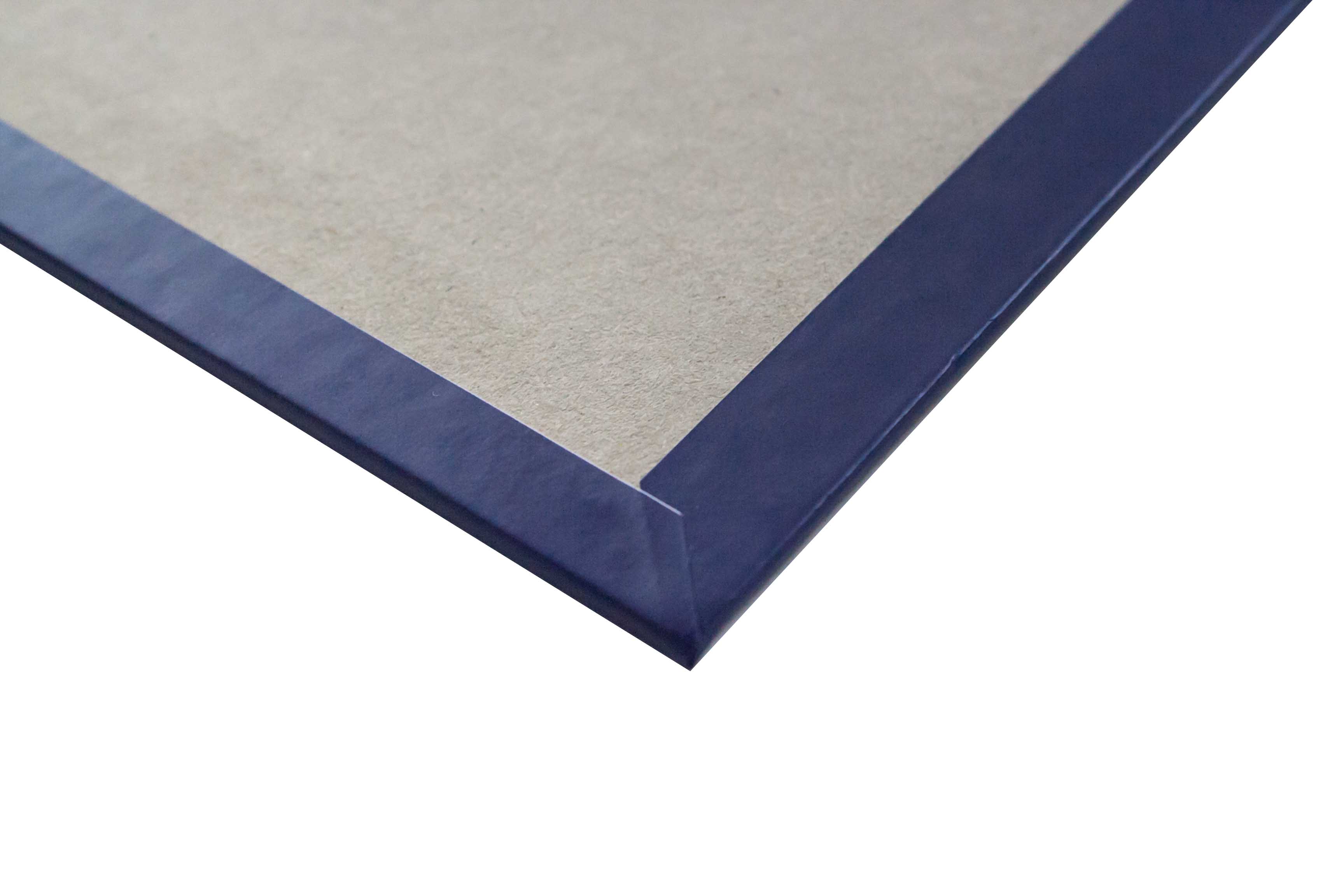 Close-up view of the corner of a gray mat board with a blue border on a white background.